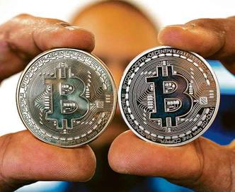 Oscilação da criptomoeda gerou euforia e atraiu milhões de compradores, mas o declínio rápido gerou dúvidas(foto: Jack Guez/AFP) Oscilação da criptomoeda gerou euforia e atraiu milhões de compradores, mas o declínio rápido gerou dúvidas(foto: Jack Guez/AFP)
