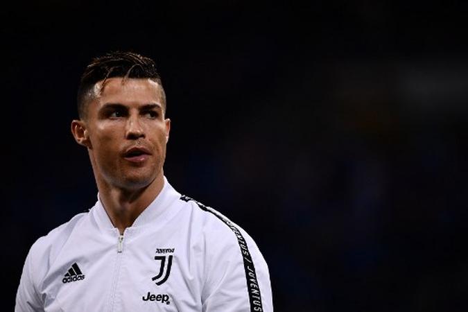 Cristiano Ronaldo em jogo da Juventus(foto: Marco Bertorello/AFP) Cristiano Ronaldo em jogo da Juventus(foto: Marco Bertorello/AFP)