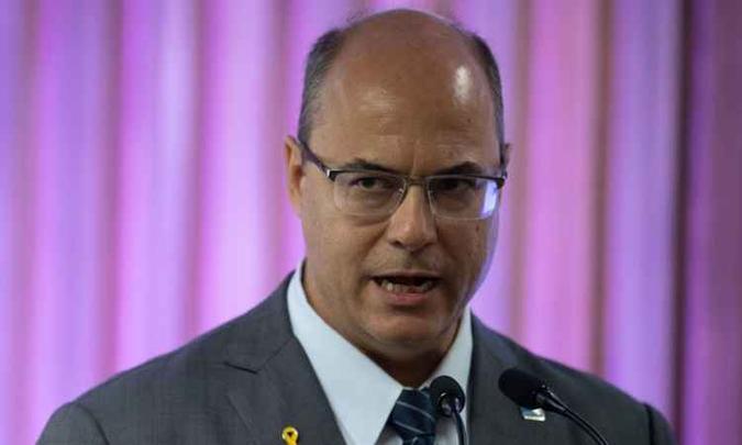 Wilson Witzel é questionado sobre participação da PM em ação que resultou na morte de uma criança(foto: AFP / Mauro Pimentel) Wilson Witzel é questionado sobre participação da PM em ação que resultou na morte de uma criança(foto: AFP / Mauro Pimentel)