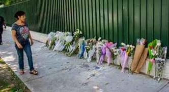 Fãs deixaram flores em rua de Seul(foto: Martin Bernetti/AFP) Fãs deixaram flores em rua de Seul(foto: Martin Bernetti/AFP)