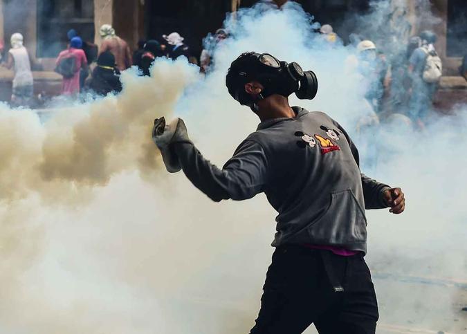 Opositor protesta contra governo Maduro(foto: RONALDO SCHEMIDT) Opositor protesta contra governo Maduro(foto: RONALDO SCHEMIDT)