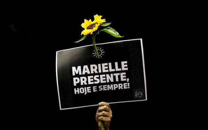 Placa levantada durante sessão solene em homenagem a vereadora Marielle Franco, realizada no Congresso Nacional.(foto: Marcelo Camargo/Agencia Brasil) Placa levantada durante sessão solene em homenagem a vereadora Marielle Franco, realizada no Congresso Nacional.(foto: Marcelo Camargo/Agencia Brasil)