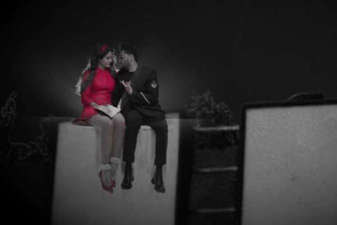 Lana Del Rey canta com The Weeknd em faixa-título de seu novo disco(foto: YouTube/Reprodução) Lana Del Rey canta com The Weeknd em faixa-título de seu novo disco(foto: YouTube/Reprodução)