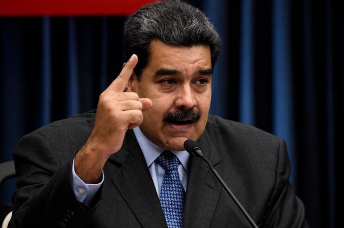 Maduro inicia no próximo dia 10 de janeiro um segundo mandato, de seis anos, após ser reeleito em votação boicotada(foto: Federico Parra/AFP) Maduro inicia no próximo dia 10 de janeiro um segundo mandato, de seis anos, após ser reeleito em votação boicotada(foto: Federico Parra/AFP)