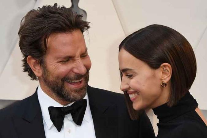 Bradley Cooper ao lado de Irina Shayk(foto: MARK RALSTON) Bradley Cooper ao lado de Irina Shayk(foto: MARK RALSTON)