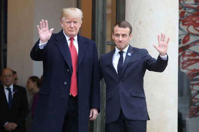 Trumo e Macron (foto: AFP / ludovic MARIN) Trumo e Macron (foto: AFP / ludovic MARIN)