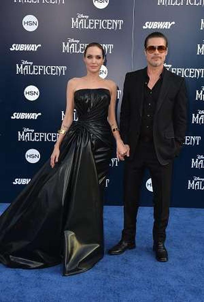 Angelina Jolie e Brad Pitt são fotografados antes do ator ser agredido (foto: Frazer Harrison / Getty Images / AFP) Angelina Jolie e Brad Pitt são fotografados antes do ator ser agredido (foto: Frazer Harrison / Getty Images / AFP)