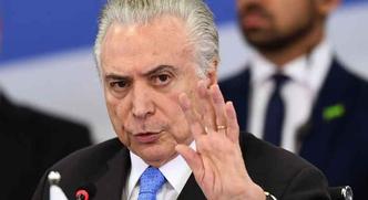 Temer ressaltou que a Embraer representa muito bem o Brasil no exterior(foto: Evaristo Sa/ AFP ) Temer ressaltou que a Embraer representa muito bem o Brasil no exterior(foto: Evaristo Sa/ AFP )