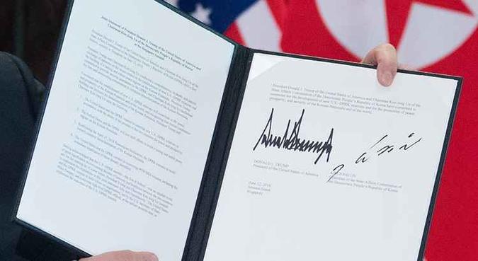 Acordo assinado(foto: Saul Loeb/AFP) Acordo assinado(foto: Saul Loeb/AFP)