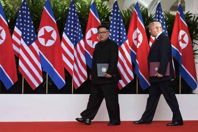 Na cúpula de Singapura, em 12 de junho, Kim nunca prometeu suspender as atividades dos locais de fabricação de mísseis(foto: Anthony Wallace/AFP) Na cúpula de Singapura, em 12 de junho, Kim nunca prometeu suspender as atividades dos locais de fabricação de mísseis(foto: Anthony Wallace/AFP)